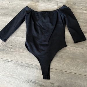 Black off shoulder body suit